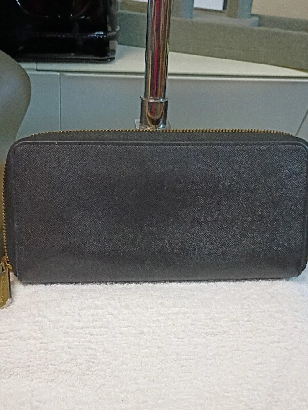 Michael Kors Black Zip-Around Saffiano Wallet with Gold Logo